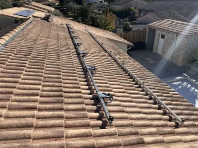 Pose de rails pour panneaux photovoltaqiues